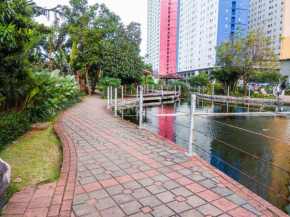 Strategic and Comfy 2BR at Green Pramuka City Apartment By Travelio